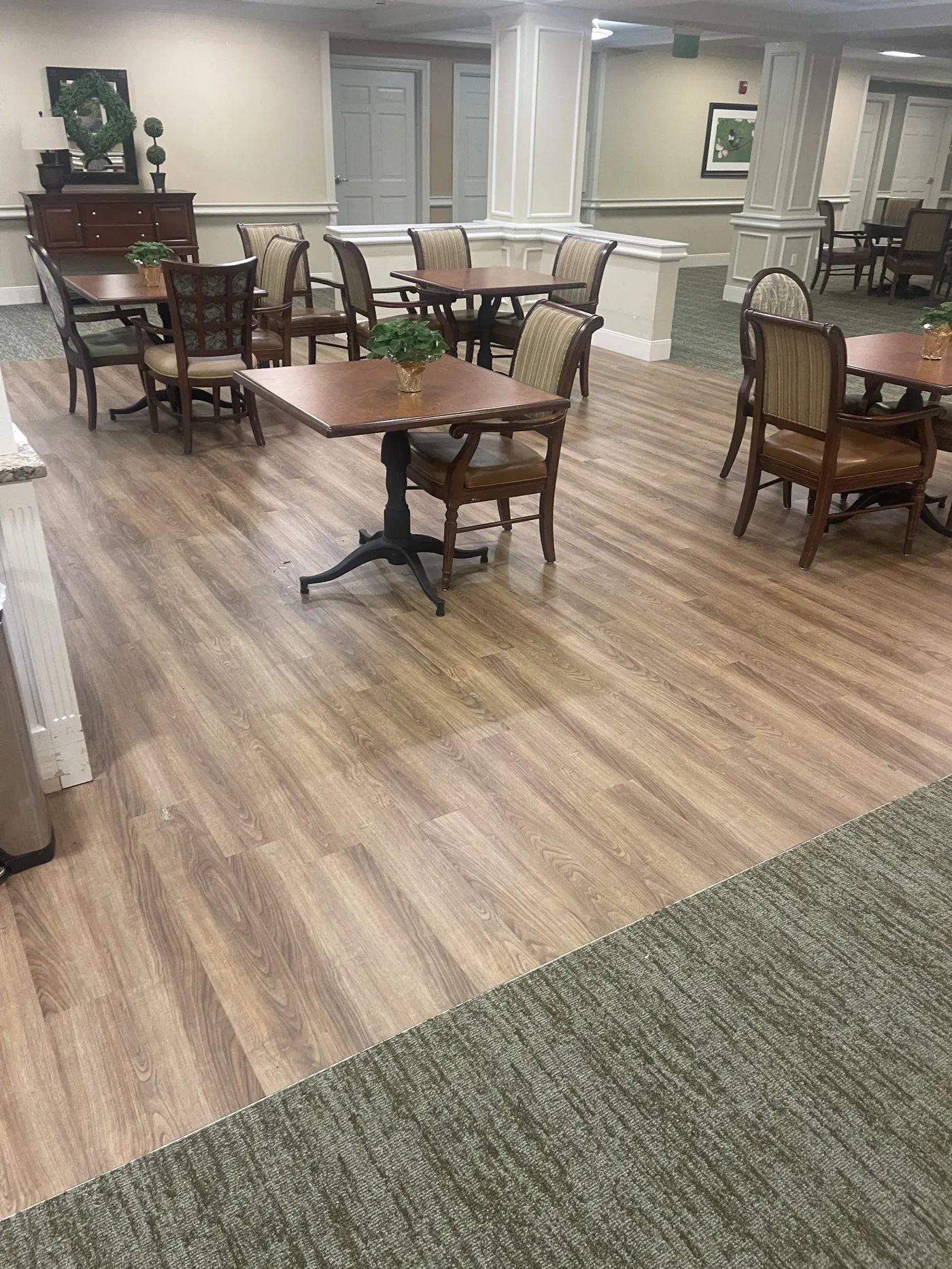 HTC wood-look flooring installation in a senior living dining space